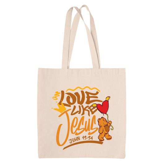 natural Beige canvas tote bag with cartoon bear holding a heart and text 'Love Like Jesus' in graffiti style on a white background