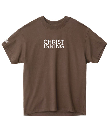 Brown t-shirt with 'CHRIST IS KING' text on a white background
